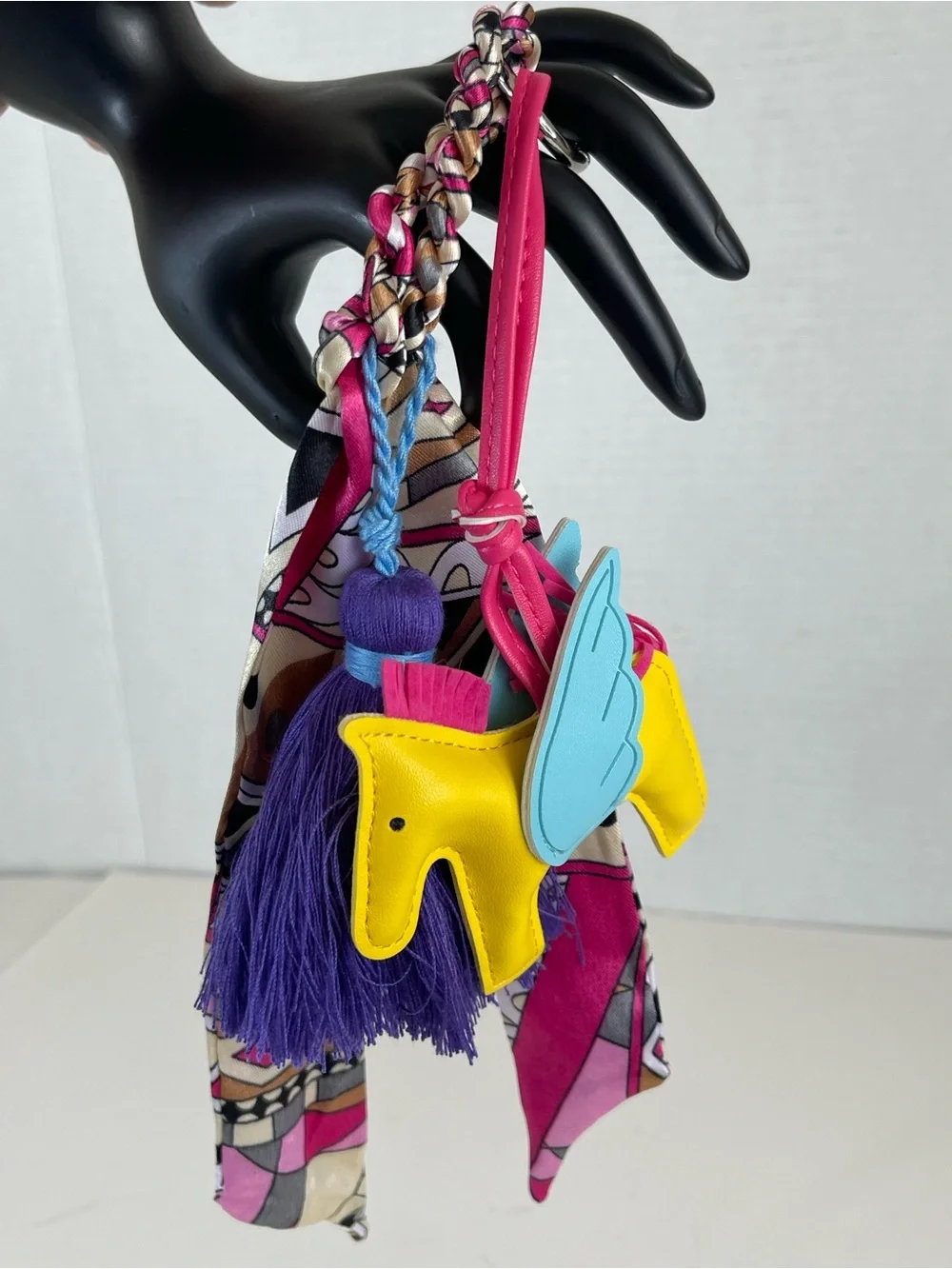 Bright Yellow Pony Bag Charm with Blue Wings and Purple Tassel